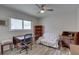 Home office with desk, chair, and wooden bookcase at 2098 Swan Ln, Safety Harbor, FL 34695