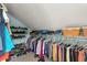 Spacious walk-in closet with shelving, hanging rods, and shoe racks, providing ample storage space at 546 18Th Ne Ave, St Petersburg, FL 33704