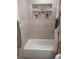 Updated bathroom with tiled shower/tub combo at 1401 W Spencer St, Plant City, FL 33563