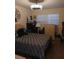 Bedroom with wood-look floors and a dresser at 1401 W Spencer St, Plant City, FL 33563