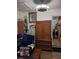 Home office features wood cabinet and laundry access at 1401 W Spencer St, Plant City, FL 33563