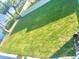 Large grassy backyard with water view at 644 Bayshore Dr, Tarpon Springs, FL 34689