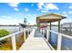 Private boat dock with covered area at 644 Bayshore Dr, Tarpon Springs, FL 34689