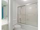 Clean bathroom with shower/tub combo and tiled floors at 660 Island Way # 301, Clearwater Beach, FL 33767