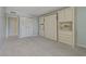 Bedroom with built-in murphy bed and closet at 660 Island Way # 301, Clearwater Beach, FL 33767