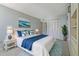 Bright bedroom with comfortable king-size bed and stylish decor at 660 Island Way # 301, Clearwater Beach, FL 33767