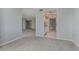 Open living area with a view into the kitchen at 660 Island Way # 301, Clearwater Beach, FL 33767