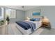 Main bedroom with king-size bed and coastal decor at 660 Island Way # 301, Clearwater Beach, FL 33767