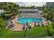 Community pool with plenty of lounge chairs at 660 Island Way # 301, Clearwater Beach, FL 33767