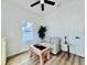 Cozy bedroom featuring a striped couch and large window at 1768 Preston S St, St Petersburg, FL 33712