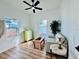 Living room with light wood floors and a comfy couch at 1768 Preston S St, St Petersburg, FL 33712