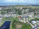 Wide aerial view showing home's location near water at 879 De Soto Way, Tarpon Springs, FL 34689