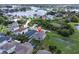 Home's location shown in wide aerial view near water at 879 De Soto Way, Tarpon Springs, FL 34689