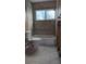 Bathroom featuring a bathtub with tiled walls, and a toilet at 253 Sunlit Cove Ne Dr, St Petersburg, FL 33702