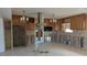 Kitchen area featuring wood cabinets and a stainless steel range hood at 253 Sunlit Cove Ne Dr, St Petersburg, FL 33702