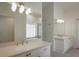 Elegant bathroom with double vanity and updated fixtures at 4050 Eagle Cove East Dr, Palm Harbor, FL 34685