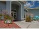 House entrance has a walkway and unique house number plaque at 4050 Eagle Cove East Dr, Palm Harbor, FL 34685