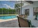 Relaxing screened pool and patio area, perfect for outdoor entertaining at 4050 Eagle Cove East Dr, Palm Harbor, FL 34685