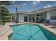 Refreshing screened pool with ample space for swimming at 4050 Eagle Cove East Dr, Palm Harbor, FL 34685