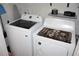 Convenient laundry room with washer and dryer included at 6546 Marlberry Way, Largo, FL 33773