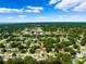 Beautiful aerial of a neighborhood with mature trees and scenic community at 1549 Linwood Dr, Clearwater, FL 33755