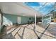 Enclosed patio has brick pavers, ceiling fans, and plenty of room for outdoor seating at 1549 Linwood Dr, Clearwater, FL 33755