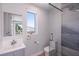 Bathroom with a shower, toilet and modern vanity at 2 4Th Ave, Indian Rocks Beach, FL 33785
