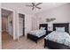 Well-lit bedroom with twin beds and ample closet space at 2 4Th Ave, Indian Rocks Beach, FL 33785