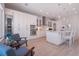 Modern white kitchen with island and stainless steel appliances at 2 4Th Ave, Indian Rocks Beach, FL 33785