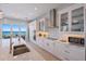 Modern kitchen with marble countertops and ocean view at 2 4Th Ave, Indian Rocks Beach, FL 33785