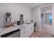 Compact kitchen with modern amenities and marble countertop at 2 4Th Ave, Indian Rocks Beach, FL 33785