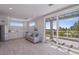 Bright living area with kitchenette and access to a balcony at 2 4Th Ave, Indian Rocks Beach, FL 33785