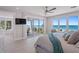 Main bedroom with ocean views and access to a private balcony at 2 4Th Ave, Indian Rocks Beach, FL 33785