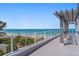 Rooftop deck with pergola, offering stunning ocean views at 2 4Th Ave, Indian Rocks Beach, FL 33785