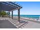 Rooftop deck with pergola, offering stunning ocean views at 2 4Th Ave, Indian Rocks Beach, FL 33785