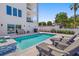 Inviting pool and spa with lounge chairs; modern design at 2 4Th Ave, Indian Rocks Beach, FL 33785