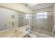 Bathroom with shower/tub combo and vanity at 12912 Willoughby Ln, Hudson, FL 34667