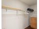 Walk-in closet with shelving and hanging rods at 12912 Willoughby Ln, Hudson, FL 34667