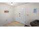 Bright and airy entryway with double doors at 12912 Willoughby Ln, Hudson, FL 34667
