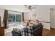 Gathering room with sliding doors leading to the pool area at 12912 Willoughby Ln, Hudson, FL 34667