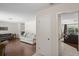 Living room with hardwood floors and neutral color palette at 12912 Willoughby Ln, Hudson, FL 34667