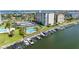 Aerial view of waterfront community, tennis courts, and pool at 660 Island Way # 401, Clearwater, FL 33767