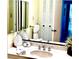 Bathroom with vanity, mirror, and linen at 660 Island Way # 401, Clearwater, FL 33767