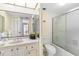 Clean bathroom with tub, toilet, and vanity at 660 Island Way # 401, Clearwater, FL 33767