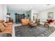 Comfortable lounge area with a fireplace and large windows at 660 Island Way # 401, Clearwater, FL 33767
