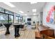 Spacious community room features comfortable seating and a piano at 660 Island Way # 401, Clearwater, FL 33767