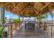Relaxing covered patio with table and chairs overlooking marina at 660 Island Way # 401, Clearwater, FL 33767