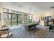 Relaxing game room, featuring a billiard table and seating area at 660 Island Way # 401, Clearwater, FL 33767