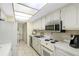 Modern kitchen with stainless steel appliances at 660 Island Way # 401, Clearwater, FL 33767