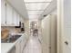 Clean galley-style kitchen with stainless steel appliances at 660 Island Way # 401, Clearwater, FL 33767